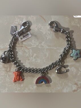 Coach Silver-Tone Charm Strap with Orange Bear & Multicolor Rainbow and More